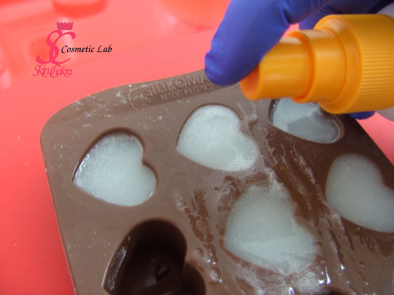 spray soap with alcohol pouring melted soap